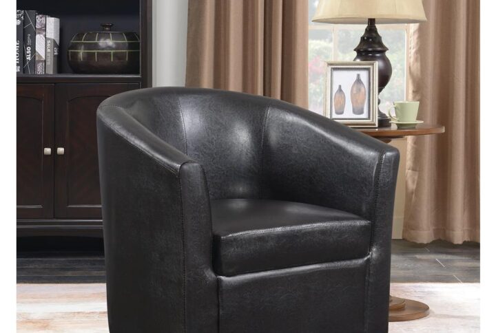 Freedom of movement adds a fresh upgrade to this swivel chair. Barrel-back design creates a comfortable seating experience and a tribute to retro fare. With dark brown leatherette upholstery