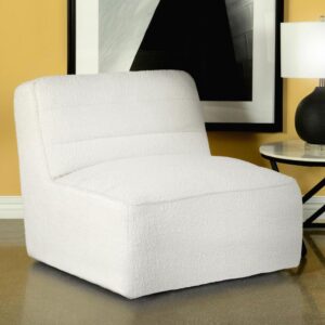 The restful low-profile design of this contemporary accent chair creates an inviting place to relax. Built with a 360-degree swivel base mechanism
