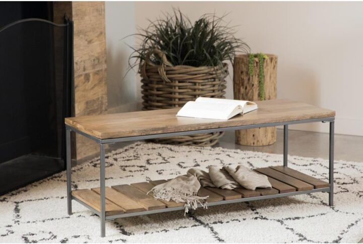Look to this accent bench to provide an industrial element in your home. This piece boasts an expansive seating area with a natural wood finish. A gunmetal frame supports the bench while adding aesthetic appeal. Below