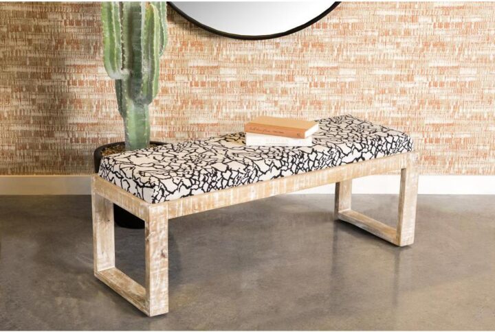 This unexpected accent bench provides a unique element in your living space. Its soft abstract fabric brings plenty of visual appeal. With a black and white motif