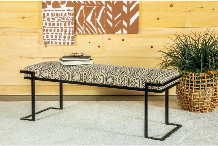 This eclectic style accent bench features geometric lines throughout the base frame and fabric that offer a modern touch and global-inspired flair. Slim and narrow by design