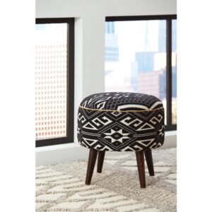 Enjoy the eclectic vibes from this ottoman with wood legs