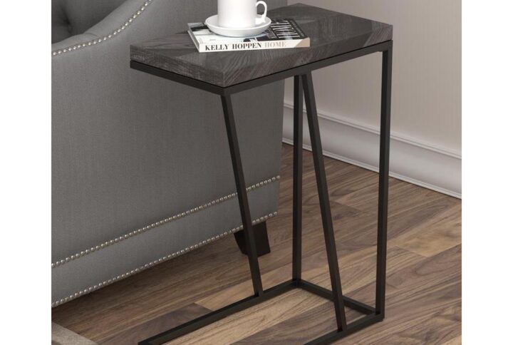 Marry the modern with the rustic in this accent table. Wood finish celebrates the rustic nature of this piece. Metal legs and base integrate the industrial aspects of this piece. Gaze upon the strength and style that this accent table brings to your space. Available in different colors and finishes to suit your needs.