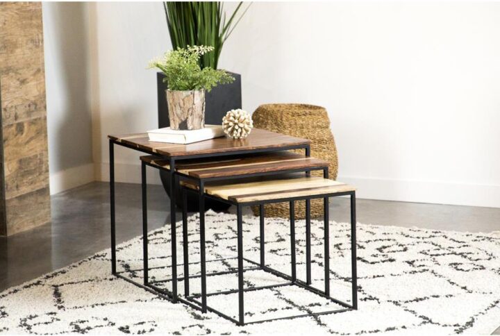 A simplistic set of three wood nesting tables brings convenience and style to your space. Rectangular sheesham tabletops have varying hues of natural wood colors
