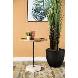 A marvelous mango wood accent table provides a mix of materials for visual interest as the round wood tabletop in a natural finish provides a spot for displaying decor. A durable metal frame keeps the tabletop and base securely in place. A striking and contrasting white marble base provides plenty of stability. Place this piece near a window with a house plant or place it beside your favorite armchair. Include this marble