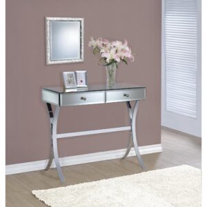Add this console table to the home for an alluring brilliance and shine. It features two spacious drawers for convenient storage. Wide table top accommodates a decorative table lamp and knickknacks. It features gorgeous curved legs that add a touch of class. Table is beautifully covered in mirror panels with chrome-finished frame and legs for a modern look.