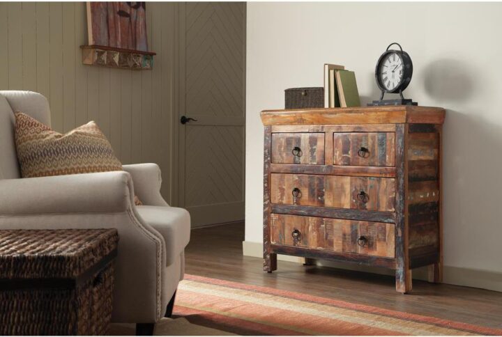 This eye-catching accent cabinet is a splendid piece that looks great in a home with rustic furnishings. It's fashioned of gorgeous reclaimed wood material for long-lasting durability. The mixture of acacia and teak wood results in an attractive combination of dark and light browns sure to add depth and character to any room. Six deep drawers with stylish metal ring pulls can accommodate linens and antique dinnerware or extra sweaters. Has enough space on top for a set of books or a favorite sculpture.