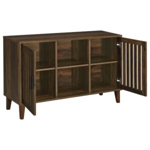 the Torin accent cabinet is built of dramatic dark pine finished rubberwood and wood products with woodgrain markings. Slatted panel door fronts add an intriguing element