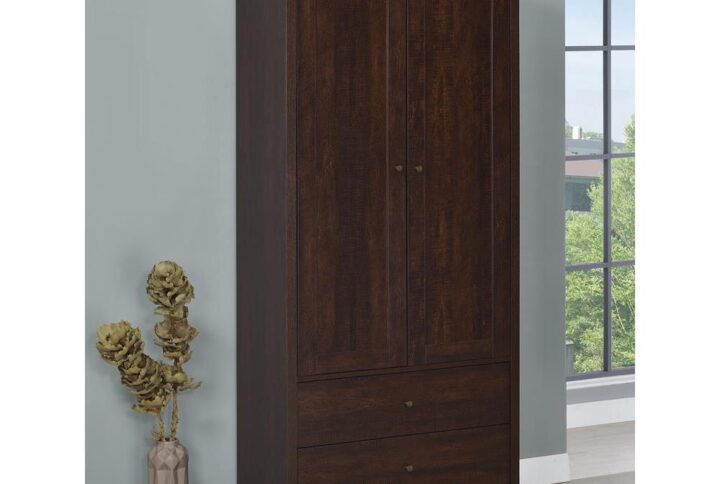This impressive accent cabinet imparts an imposing presence to the home. At over six feet tall