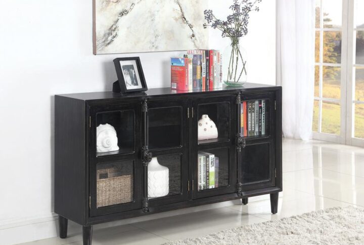 This wide accent cabinet provides plenty of storage capability for the home. It's meticulously crafted with four glass doors for easy access to interior storage. At five feet in length