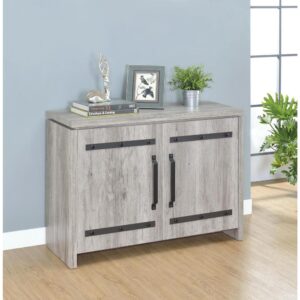 This accent cabinet is a stylishly modern addition to the home. The fetching cabinet has a simple