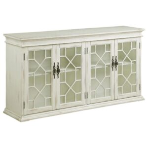 this long and spacious cabinet invites you to showcase personal belongings and decor behind dual glass pane doors. Adding to the timelessness of this furniture piece is a fretwork motif across each door