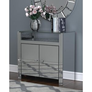 Accent a contemporary dining room or entertainment space with this silver accent cabinet. The crisp linear design lends a modern silhouette