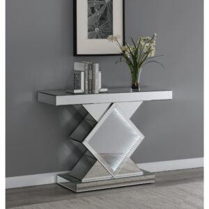 Compliments will keep coming when guests behold this extraordinary silver console table. The mirrored finish adds a twinkling touch while the center diamond-shape framed provides pizzazz. A spacious rectangular tabletop allows for display of decor