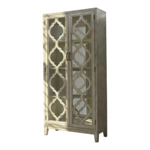 luxurious look in any living or dining room. This two-door accent cabinet is a dramatic addition with vintage charm and plenty of interior storage behind two glass doors. The back panel of the cabinet is mirrored