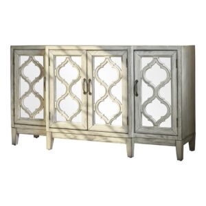 This traditional accent cabinet adds an elegant feel to your home. It's crafted in a gorgeous white finish and features tapered legs. The rectangular top is spacious enough for lamps