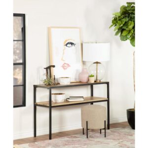 this console table lends a striking contrast within a sustainably minded home. Rest this sleek console table within an entryway foyer for a clean