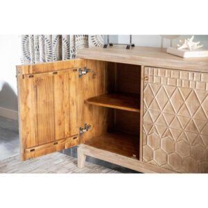 its stunning distressed white finish makes it appear weathered and well-loved. Geometric designs elegantly cover the two cabinet door panels. Store your prized possessions inside this wood cabinet on the two interior shelves. This piece was made in India.