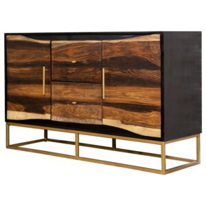 this piece flaunts a range of natural wood colors. Two cabinet drawers boast sleek gold bar pulls. Meanwhile