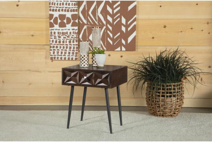 Showcase the striking woodgrains of this solid mango wood accent table