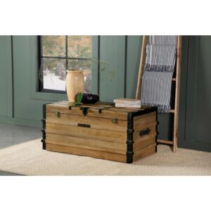 this rustic storage trunk lends a country charm to a space. Built with an eco-friendly mango wood for a sustainable touch to a home