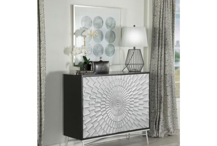 A radial sunburst design lends a striking Art Deco flair to this contemporary accent cabinet. Dual cabinets draw the eye further with a shimmering silver finish