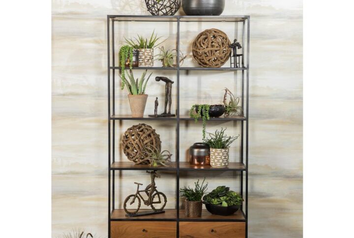 Add warmth to your living area with this natural acacia etagere. Four spacious shelves are perfect for displaying house plants and decor. The bold black frame contrasts with the shelves and provides a rustic touch. Four bottom drawers offer a space to store small items. This piece is supported on a black geometric base.