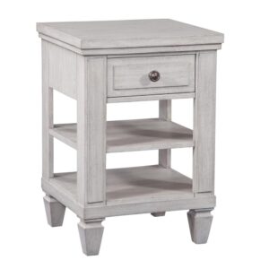 The Salter Path 1-Drawer Nightstand is a casual classic with modern touches and designer details.  The White Oyster wire-brushed finish with flecks of gray offers a natural textured look.  Antiqued silver knob and square tapered feet add flair to this beautiful nightstand.  Also features two shelves for additional storage
