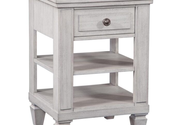 The Salter Path 1-Drawer Nightstand is a casual classic with modern touches and designer details.  The White Oyster wire-brushed finish with flecks of gray offers a natural textured look.  Antiqued silver knob and square tapered feet add flair to this beautiful nightstand.  Also features two shelves for additional storage