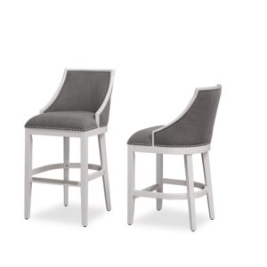 Defined by gracefully swooped arms and brushed nickel nailhead trim the Lanie bar stool will be an elegant addition to your kitchen or bar. The solid hardwood frame is finished in off-white and accented by beautiful grey fabric on the seat and back. Sturdy tapered legs and a four-sided stretcher provide strength and a comfortable footrest protected by a metal kickplate.