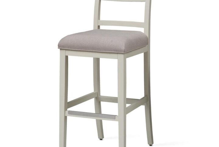 The transitional white Talia Stool will fit effortlessly into your design space inviting all your friends and family to sit and stay a while.   The frame and chair back are constructed of Asian hardwood solids in a white finish