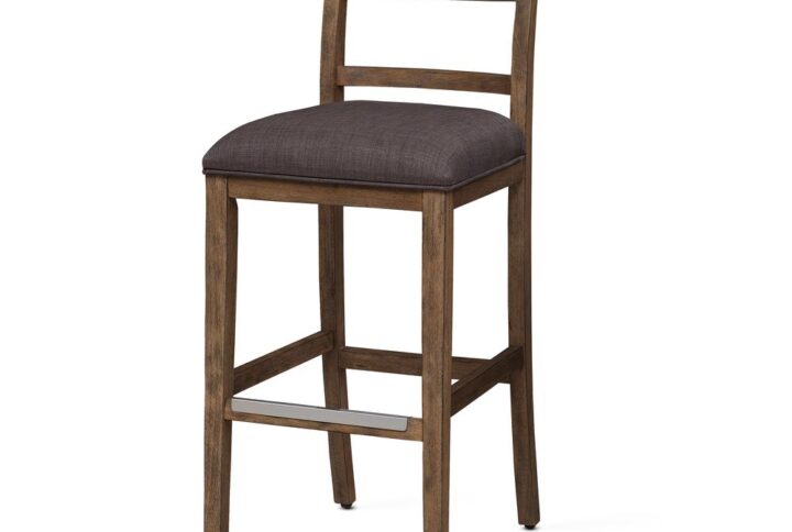 The transitional brown Talia Stool will fit effortlessly into your design space inviting all your friends and family to sit and stay a while.   The frame and chair back are constructed of Asian hardwood solids in a multi-step wire brushed brown finish