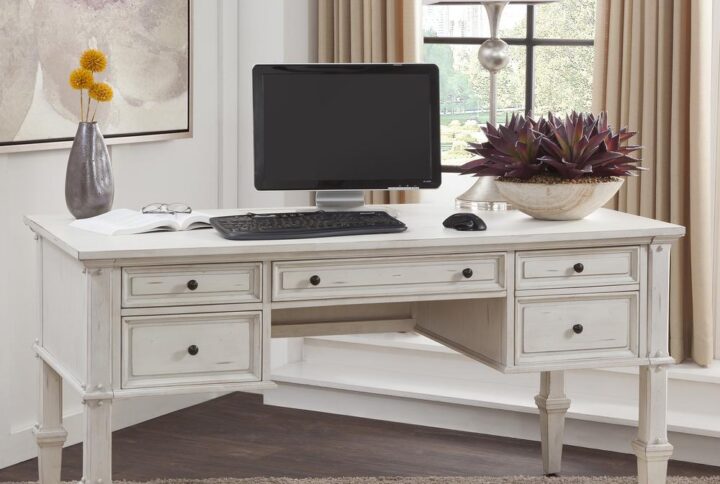 The Sedona Storage Desk is trending for a look that is rustic yet refined.  The distressed antique cobblestone white finish with rub through and detailed molding creates a sense of vintage charm in an up to date style.  Sturdily crafted of kiln-dried hard wood solids with mango veneers and drawers with English dovetail joinery and full extension ball bearing metal side guides for ease of operation.  There are three drawers with ample storage space to keep you well organized and one deep hanging file drawer that will accommodate either letter or legal size files.   All drawers feature picture framed drawer fronts with antiqued metal knobs.  You will be delighted with the extra bonus of the concealed USB ports and electrical outlets with easy access.
