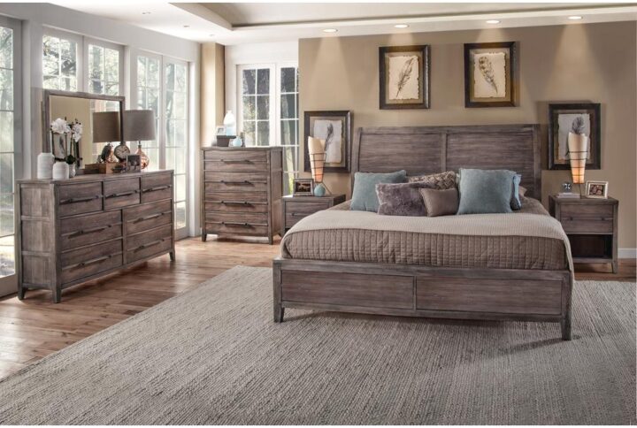 The Aurora bedroom collection has rustic character paired with industrial features in an antiqued weathered grey finish that lends a feeling of strength and simplicity.  The Aurora Sleigh Bed features a sleigh-inspired headboard accented by planked details and heavy molding with a low panel footboard.  Your purchase includes the queen sleigh headboard