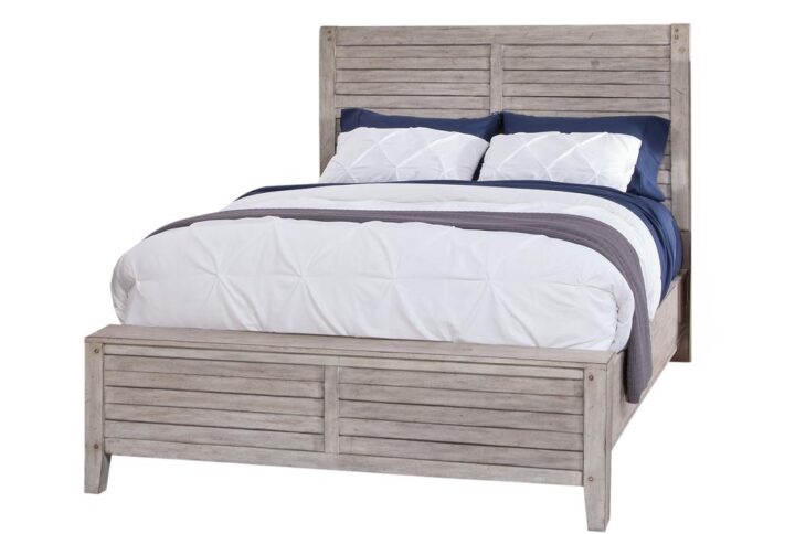 The Aurora bedroom collection has rustic character paired with industrial features in an antiqued whitewashed finish that lends a feeling of strength and simplicity.  This simple panel bed is accented by planked details and heavy molding on both the high headboard and low footboard.  Your purchase includes the queen panel headboard
