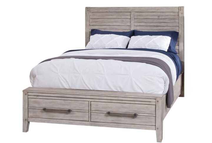 The Aurora bedroom collection has rustic character paired with industrial features in an antiqued whitewashed  finish that lends a feeling of strength and simplicity.  The simple panel headboard is accented by planked details and heavy molding.  The footboard offers two storage drawers for your blankets and pillows. Your purchase includes the queen panel headboard