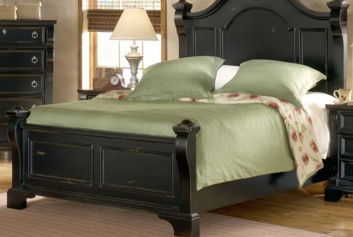 An heirloom is a timeless treasure that passes from generation to generation bringing each family member immeasurable joy through memories. The Heirloom Queen Poster Bed is a masterful piece of tradition that is finished in a distressed black finish with hints of gold rubbed through. The decorative arched crown rail is reminiscent of late 17th century architecture. Its centered medallion shape decoration and magnificently curved posts nostalgically frame the decorative dome beading of the headboard and the adorning panels of the footboard. Enjoy a tradition of creating ageless family heirlooms with the Heirloom Queen Poster Bed.