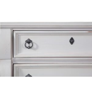 An heirloom is a timeless treasure that passes from generation to generation bringing each family member immeasurable joy through memories. The Heirloom Five Drawer Chest is a masterful piece of tradition finished in a distressed antique white with rubbed through highlights. From the heavy top to the beaded drawer fronts this chest of drawers was made to love for generations. The pewter ring pulls are brushed for a traditional look and feel. The drawers feature roller bearing side glides with positive drawer stops for years of smooth quiet function. And the 14 ½" drawers have English dovetail construction and fully finished interiors for a lifetime of snag free use. Enjoy a tradition of creating ageless family heirlooms with the Heirloom Five Drawer Chest.