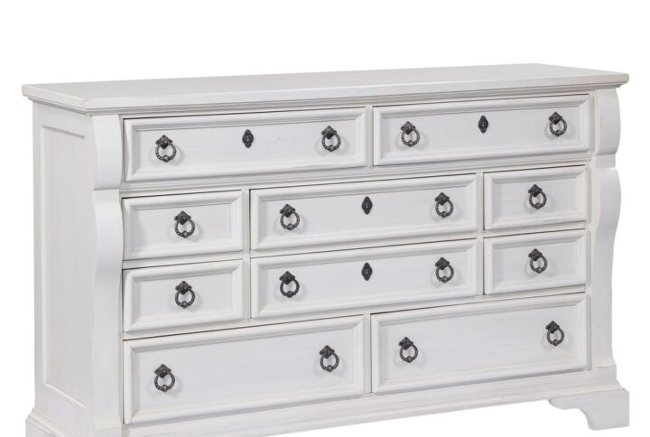 An heirloom is a timeless treasure that passes from generation to generation bringing each family member immeasurable joy through memories. The Heirloom Triple Dresser is a masterful piece of tradition finished in a distressed antique white with rubbed through highlights. From the heavy top to the beaded drawer fronts this dresser was made to love for generations. The pewter ring pulls are brushed for a traditional look and feel. The drawers feature roller bearing side glides with positive drawer stops for years of smooth quiet function. And the 14 ½" drawers have English dovetail construction and fully finished interiors for a lifetime of snag free use. Enjoy a tradition of creating ageless family heirlooms with the Heirloom Triple Dresser.
