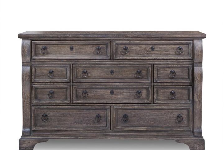 An heirloom is a timeless treasure that passes from generation to generation bringing each family member immeasurable joy through memories. The Heirloom Triple Dresser is a masterful piece of tradition finished in a distressed rustic charcoal with rubbed through highlights. From the heavy top to the beaded drawer fronts this dresser was made to love for generations. The pewter ring pulls are brushed for a traditional look and feel. The drawers feature roller bearing side glides with positive drawer stops for years of smooth quiet function. And the 14 ½" drawers have English dovetail construction and fully finished interiors for a lifetime of snag free use. Enjoy a tradition of creating ageless family heirlooms with the Heirloom Triple Dresser.