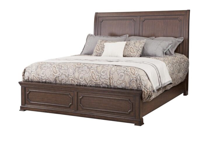 Kestrel Hills brings traditional style and elegance to the bedroom for today's home fashion. The exquisite and rich finish on this collection are highlighted by the figure of the mango veneers and the transitional metal hardware is the perfect jewelry for the high end finish and wood tone.   The low profile Queen Sleigh Bed featuring framed panels on the headboard and footboard