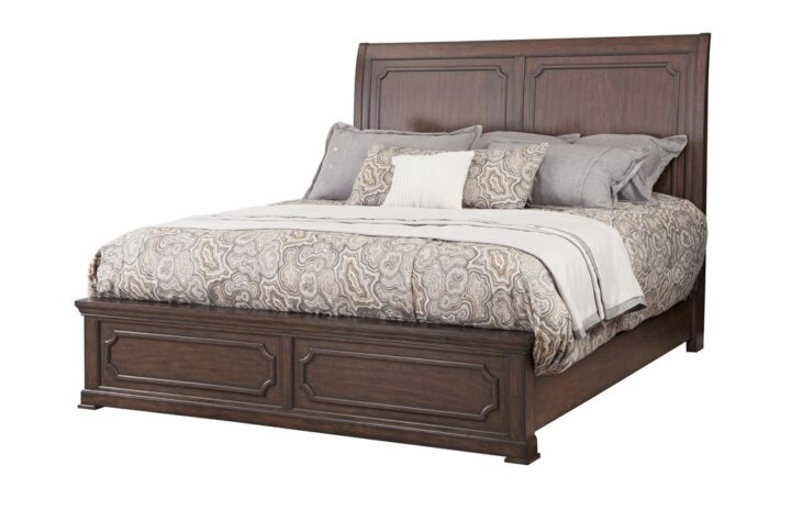 Kestrel Hills brings traditional style and elegance to the bedroom for today's home fashion. The exquisite and rich finish on this collection are highlighted by the figure of the mango veneers and the transitional metal hardware is the perfect jewelry for the high end finish and wood tone.   The low profile King Sleigh Bed featuring framed panels on the headboard and footboard