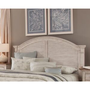 time-worn appeal.  The beautiful crackled white finish of the Cottage Traditions Arched Panel Queen Headboard will bring timeless style to your bedroom while the mahogany solids and solid wood framing ensure strength and durability.  The double panel headboard is accented by gorgeous louvered inserts and wide crown moldings for an elegant and timeless style. Headboard attaches to most standard metal bed frames.  Your purchase includes a Queen Headboardy only.