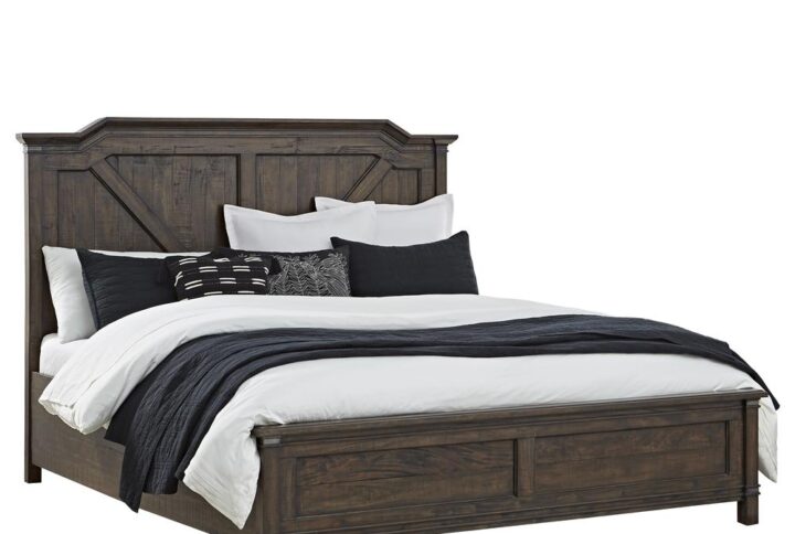 The roughhewn look and planked case tops combine with a smooth finish to create the rustic elegance of the Farmwood Bedroom Collection. The King Panel Bed design details include timberframe raised panels on the headboard