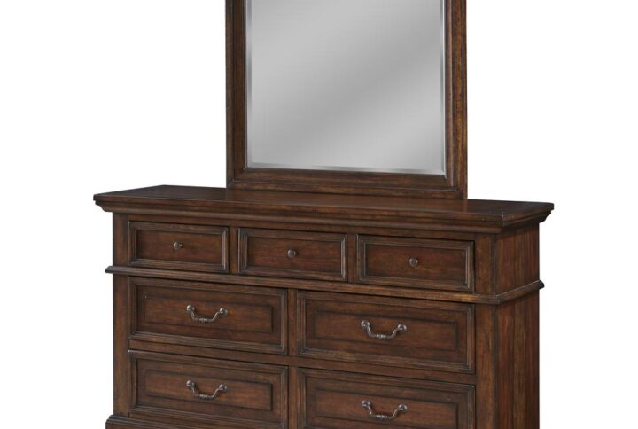 Make the warm and welcoming Stonebrook Bedroom collection a part of your home.  The rich tobacco finish is lightly distressed giving character to this well crafted collection.  The Stonebrook Dresser features 7 drawers for abundant storage along with detailed molding and hammered metal knobs and drawer pulls.  To prevent snagging