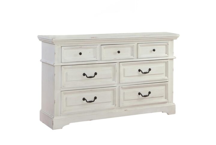 Make the warm and welcoming Stonebrook Bedroom collection a part of your home.  The Distressed Antique White finish gives character to this well crafted collection.  The Stonebrook Dresser features 7 drawers for abundant storage along with detailed molding and hammered metal knobs and drawer pulls.  To prevent snagging