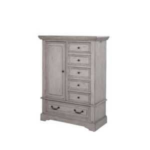 Make the warm and welcoming Stonebrook Bedroom collection a part of your home.  The distressed antique gray finish is accented by detailed moldings with hammered metal knobs and drawer pulls giving character to this well crafted collection.  The Stonebrook Gentleman's Chest features multiple storage options with 5 side drawers