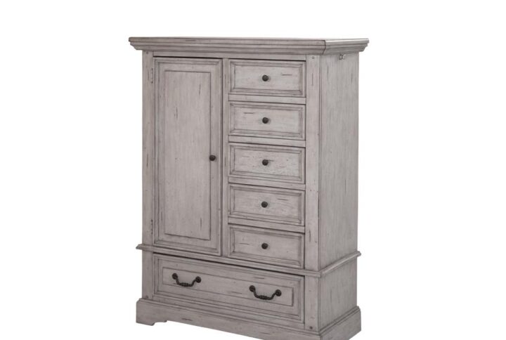 Make the warm and welcoming Stonebrook Bedroom collection a part of your home.  The distressed antique gray finish is accented by detailed moldings with hammered metal knobs and drawer pulls giving character to this well crafted collection.  The Stonebrook Gentleman's Chest features multiple storage options with 5 side drawers