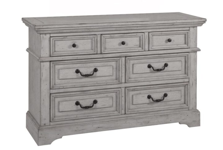 The warm and welcoming Stonebrook Youth Bedroom collection is scaled perfectly for smaller spaces.  The Antique Gray finish is lightly distressed giving character to this well crafted collection.  The Stonebrook Double Dresser features 7 drawers for abundant storage along with detailed molding and hammered metal knobs and drawer pulls.  To prevent snagging