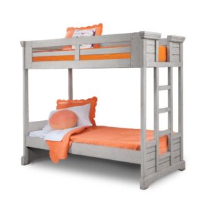 The warm and welcoming Stonebrook Youth Bedroom collection is scaled perfectly for smaller spaces. The Antique Gray finish is lightly distressed giving character to this well crafted collection.  The Twin Over Twin Bunk Bed includes guardrails